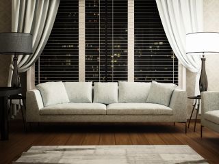 Mini Blinds | Blinds & Shades San Diego CA Detail of mini blinds installed in a cozy home environment, enhancing privacy and style.